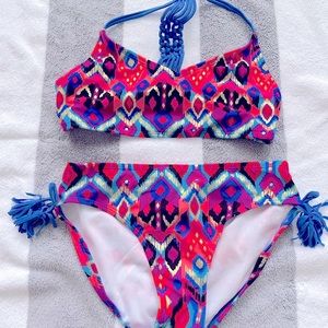 Girls size L 10/12 jewel tone bikini swimsuit. Never worn.